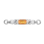 A Citrine and Diamond Brooch the emerald-cut citrine within a geometric border of eight-cut