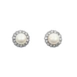 A Pair of Cultured Pearl and Diamond Cluster Earrings the cultured pearls within borders of eight-