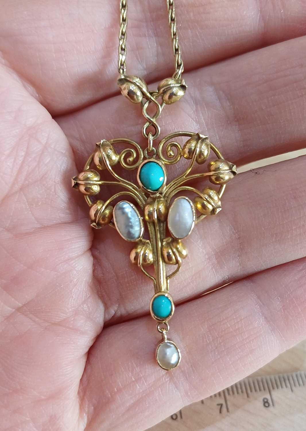 A Turquoise and Mother-of-Pearl Pendant on Chain the openwork scroll and foliate motif frame - Image 3 of 4