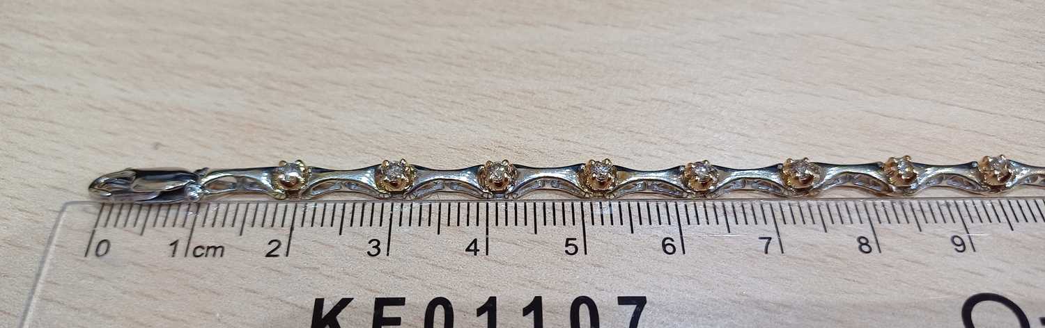 A Diamond Bracelet white tapered bars spaced by round brilliant cut diamonds in yellow claw - Image 3 of 4