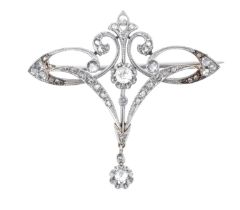 An Early 20th Century Diamond Brooch of openwork scroll form, set throughout with old cut and rose