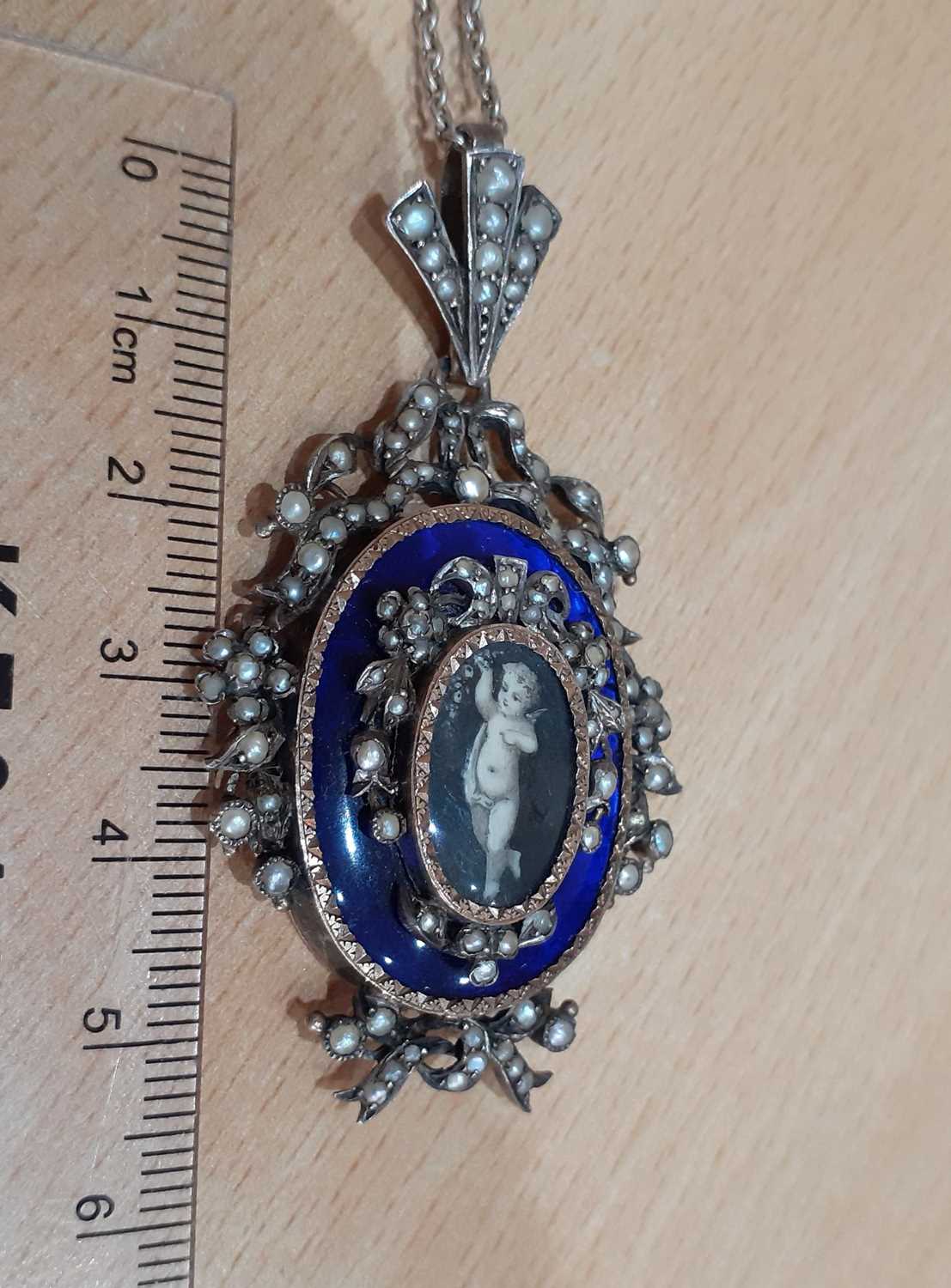 An Enamel and Split Pearl Pendant on Chain, circa 1815 the central locket compartment containing a - Image 2 of 4