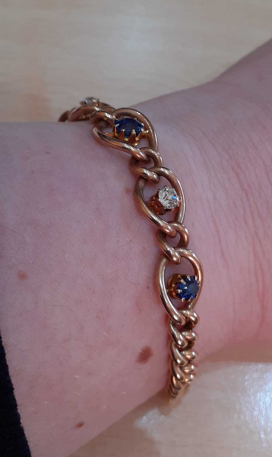 A Sapphire and Diamond Bracelet three graduated oval cut sapphires alternate with two old cut - Image 4 of 5