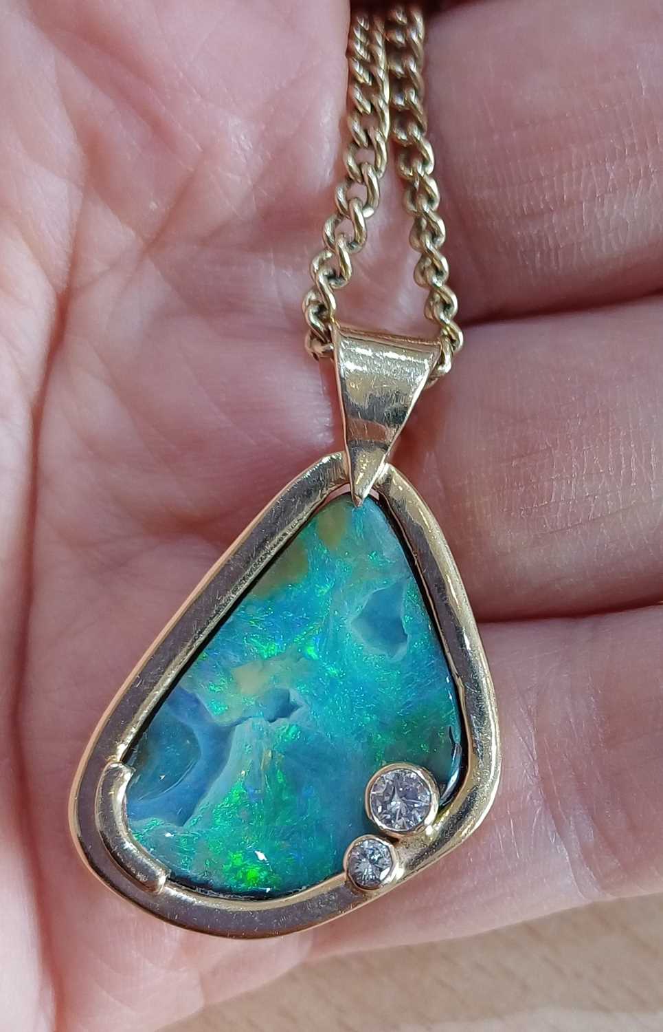 An Opal and Diamond Pendant on Chain the irregular shaped opal plaque decorated with two round - Image 2 of 4