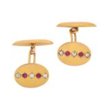 A Pair of Ruby and Diamond Cufflinks, by Hamann & Koch the yellow oval plaques inset with two