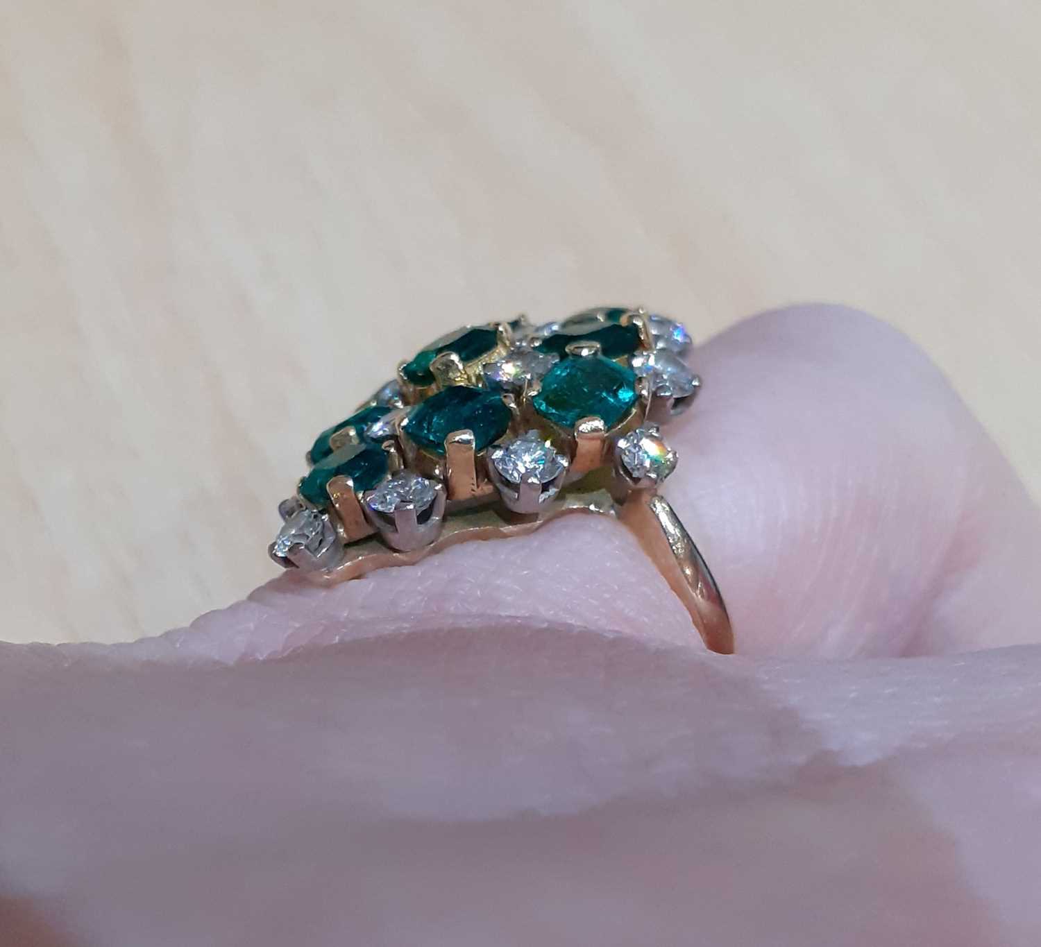 A 14 Carat Gold Emerald and Diamond Cluster Ring the kite motif comprising of emerald-cut emeralds - Image 5 of 6
