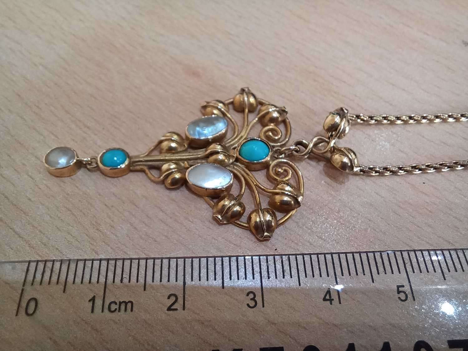 A Turquoise and Mother-of-Pearl Pendant on Chain the openwork scroll and foliate motif frame - Image 2 of 4