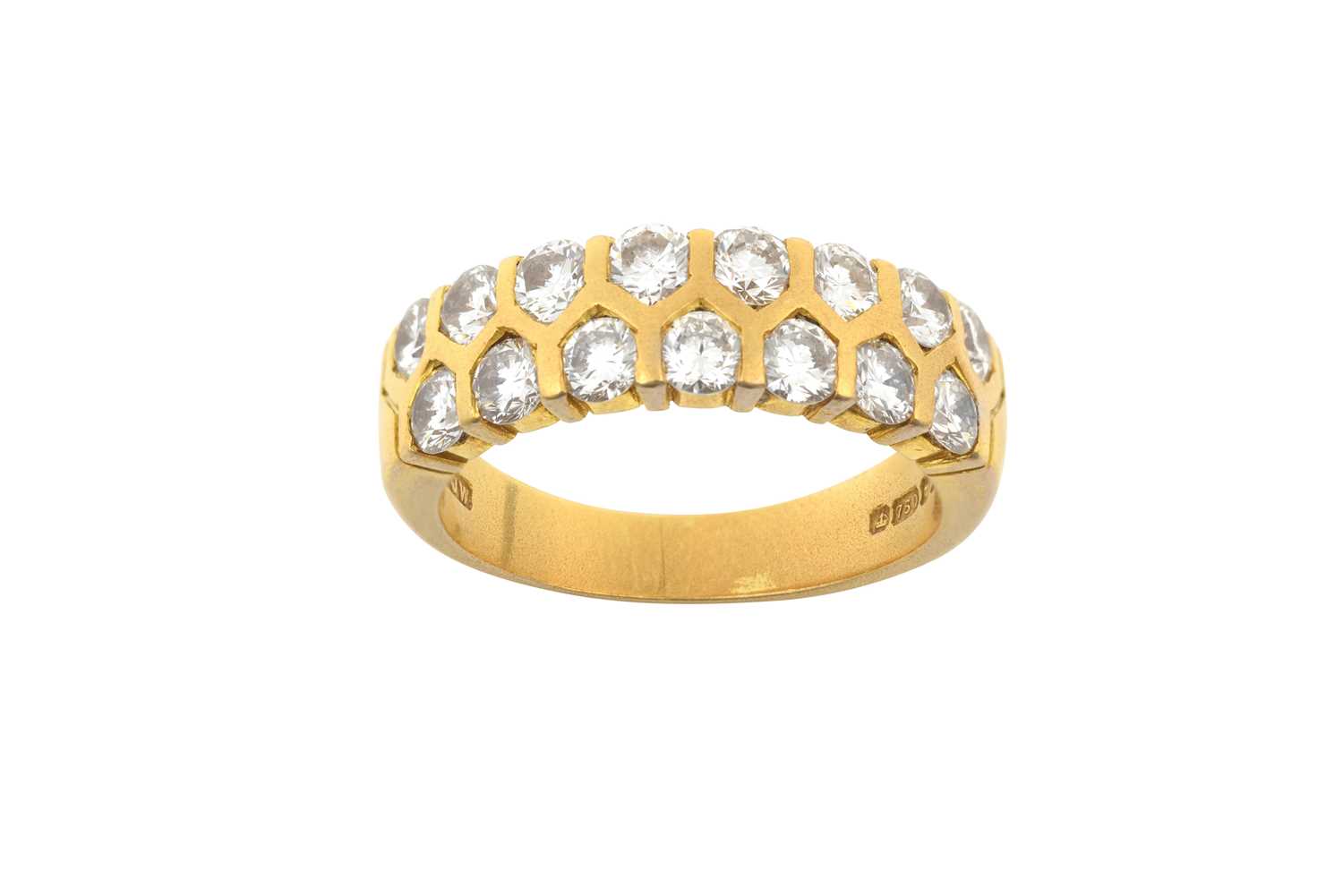 An 18 Carat Gold Diamond Half Hoop Ring two rows of round brilliant cut diamonds in yellow tension