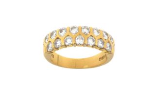 An 18 Carat Gold Diamond Half Hoop Ring two rows of round brilliant cut diamonds in yellow tension