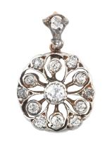 A Diamond Pendant the central old cut diamond to a circular openwork frame set throughout with old