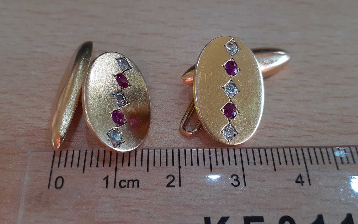 A Pair of Ruby and Diamond Cufflinks, by Hamann & Koch the yellow oval plaques inset with two - Image 2 of 3