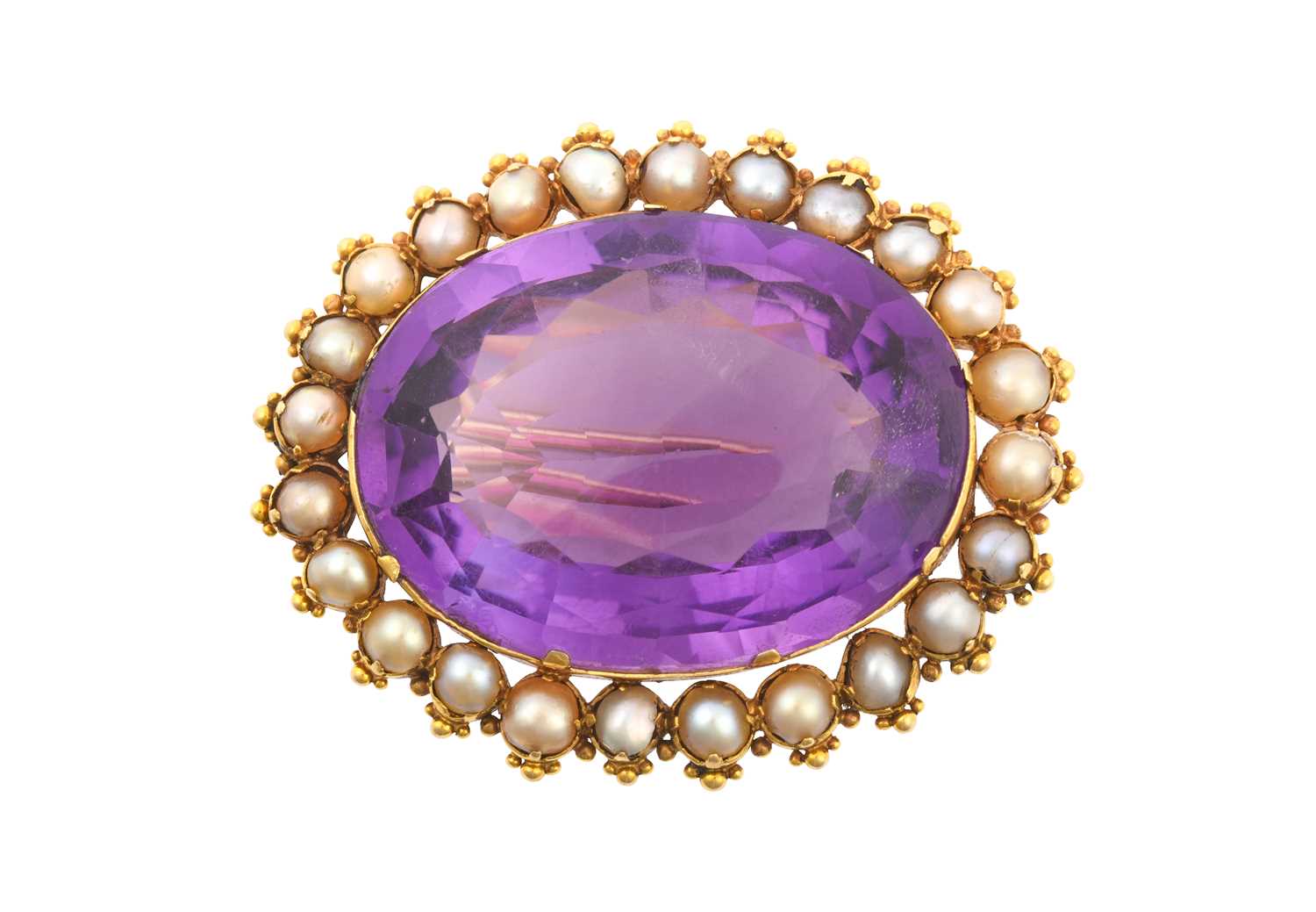 An Amethyst and Split Pearl Brooch the oval cut amethyst within a border of split pearls, in