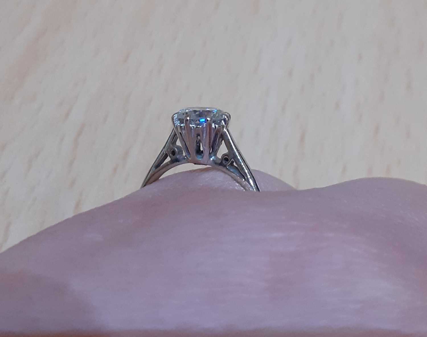 An 18 Carat White Gold Diamond Solitaire Ring the round brilliant cut diamond in a claw setting, - Image 3 of 4