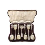 A Cased Set of Six Victorian Parcel-Gilt Silver Berry-Spoons and a Sifting Spoon, by Henry John Lia