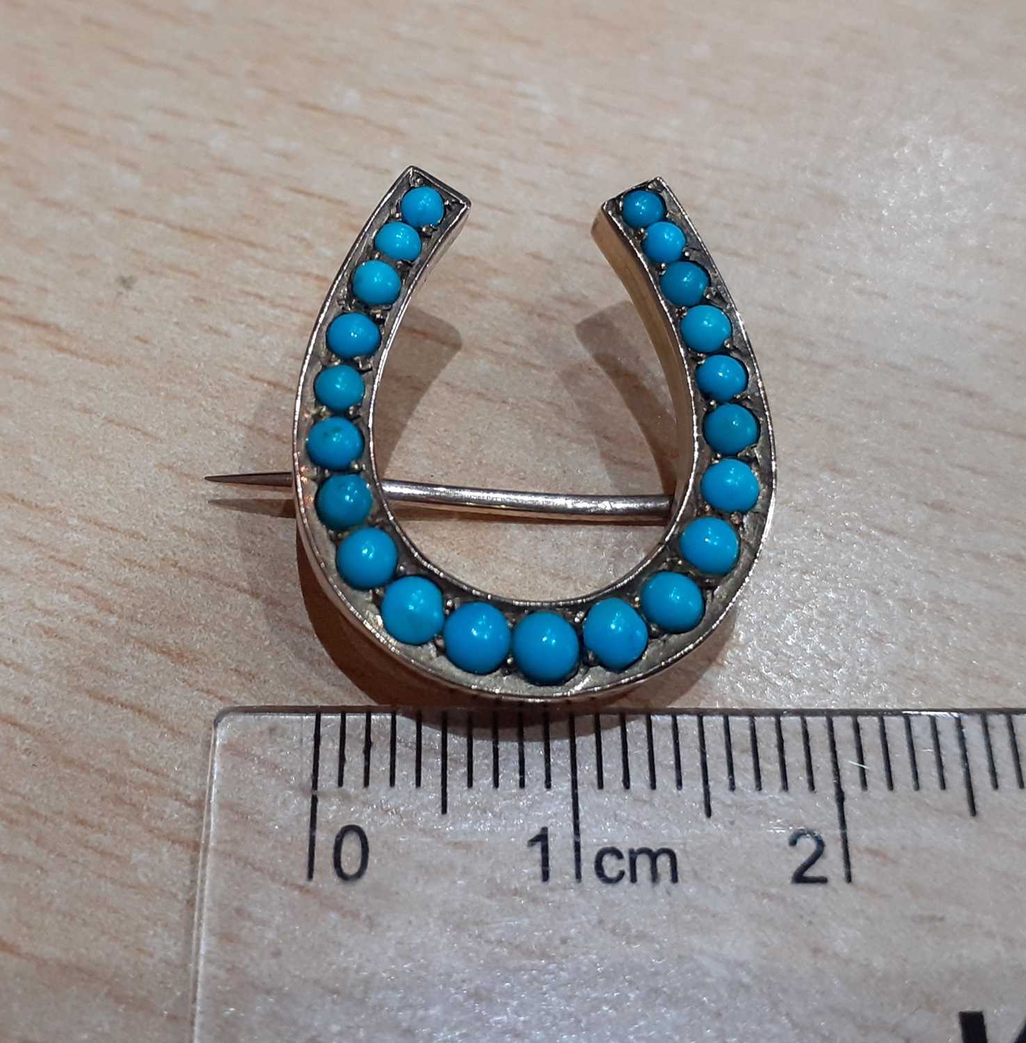 A Victorian Turquoise Brooch the horseshoe motif set throughout with graduated round cabochon - Image 2 of 3