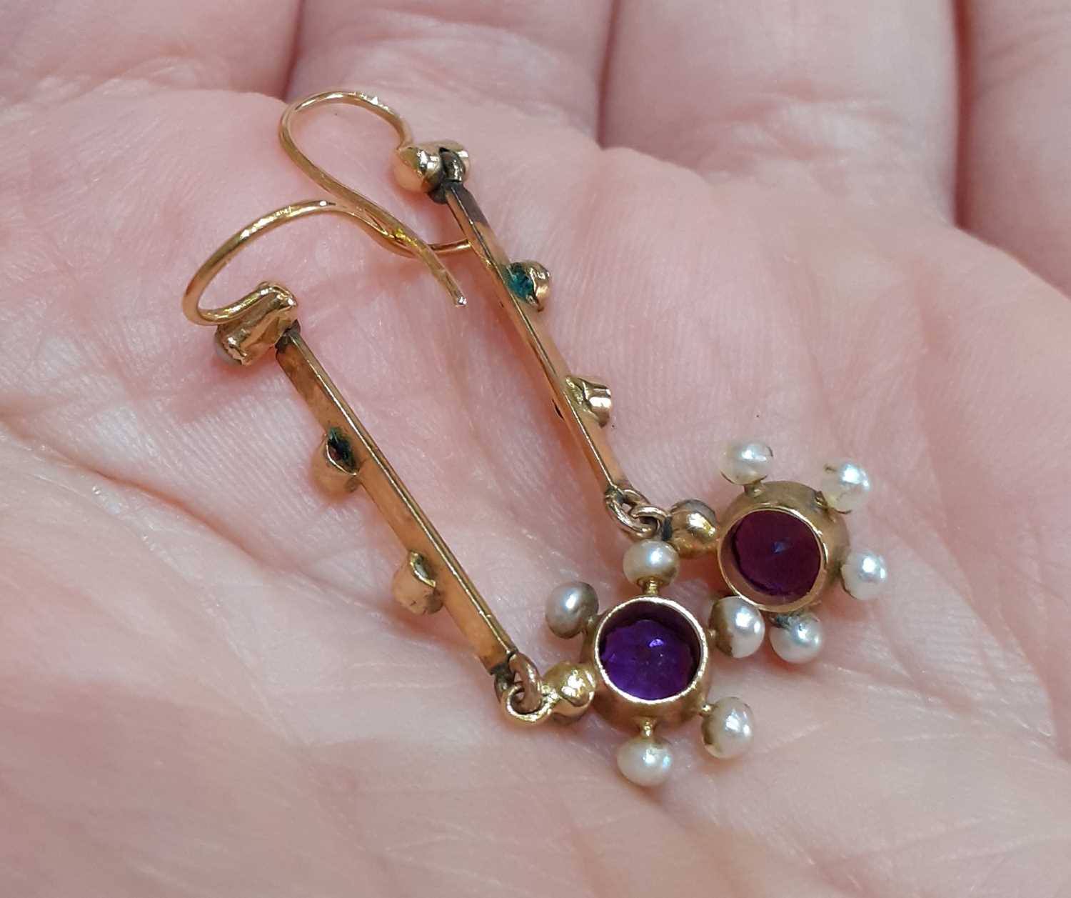 A Pair of Early 20th Century Amethyst and Seed Pearl Drop Earrings the round cut amethyst in a - Image 3 of 4