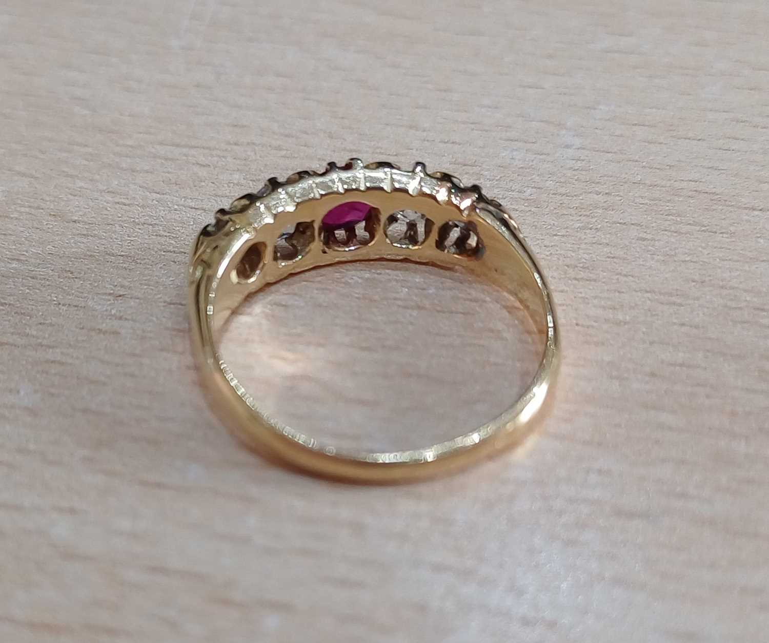 An 18 Carat Gold Ruby and Diamond Five Stone Ring the round cut ruby flanked by graduated old cut - Image 4 of 4