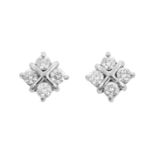 A Pair of Diamond Cluster Earrings four round brilliant cut diamonds in white claw settings,