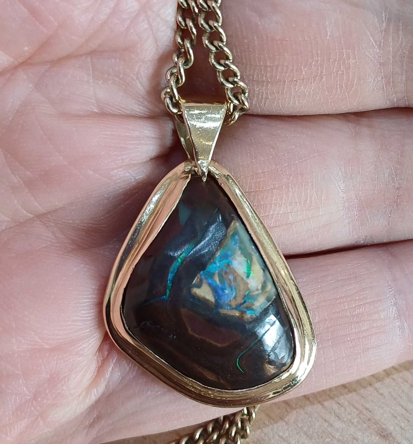 An Opal and Diamond Pendant on Chain the irregular shaped opal plaque decorated with two round - Image 4 of 4
