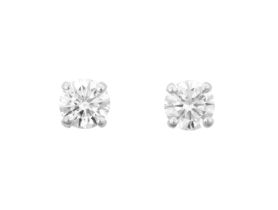 A Pair of 18 Carat Gold Diamond Solitaire Earrings the round brilliant cut diamonds in white claw