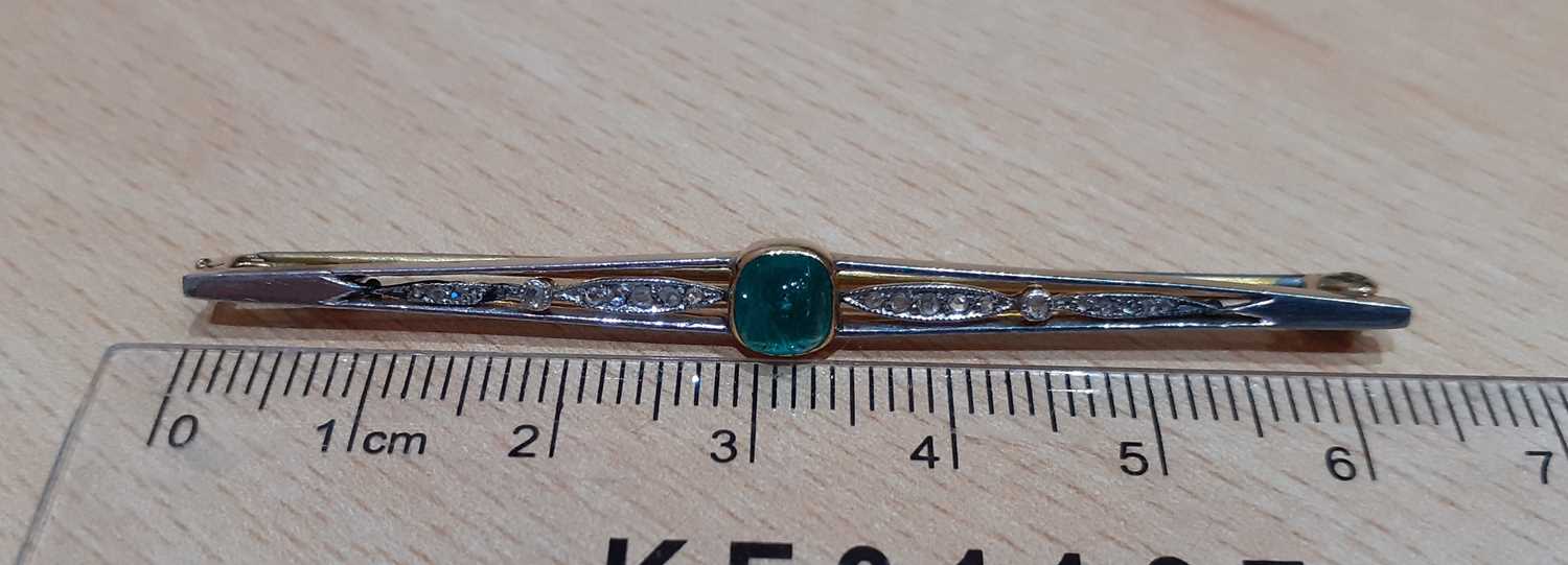 An Emerald and Diamond Brooch the sugarloaf cabochon emerald in a yellow rubbed over setting, to a - Image 3 of 3