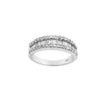 A Diamond Half Hoop Ring a row of tapered baguette cut diamonds within two rows of round brilliant