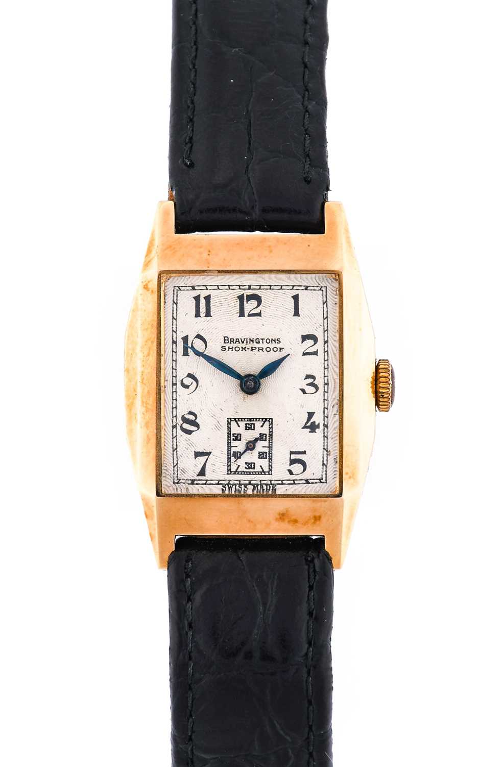 An Art Deco 9ct Gold Wristwatch, retailed by Bravingtons, 1939, lever movement, engine turned dial