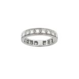 A Diamond Eternity Ring the nineteen round brilliant cut diamonds in white claw and channel