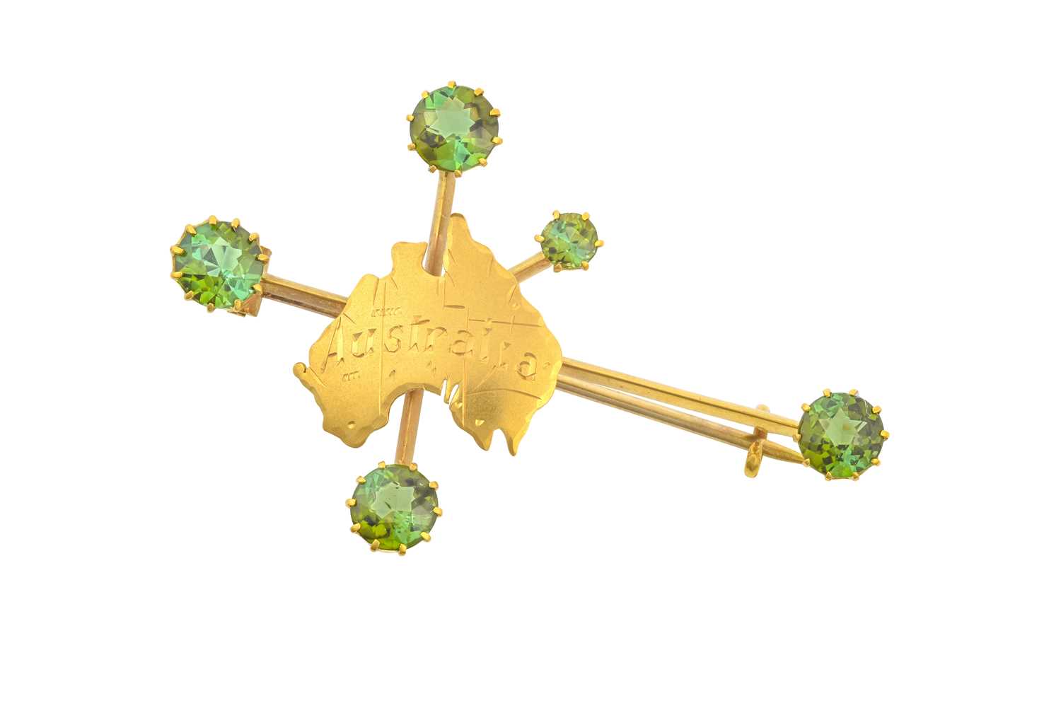 A Green Tourmaline Brooch a yellow knife edge bar overlaid with a plaque depicting Australia, with