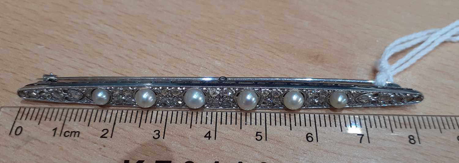 An Edwardian Pearl and Diamond Brooch the tapering bar set throughout with six graduated pearls - Image 2 of 3