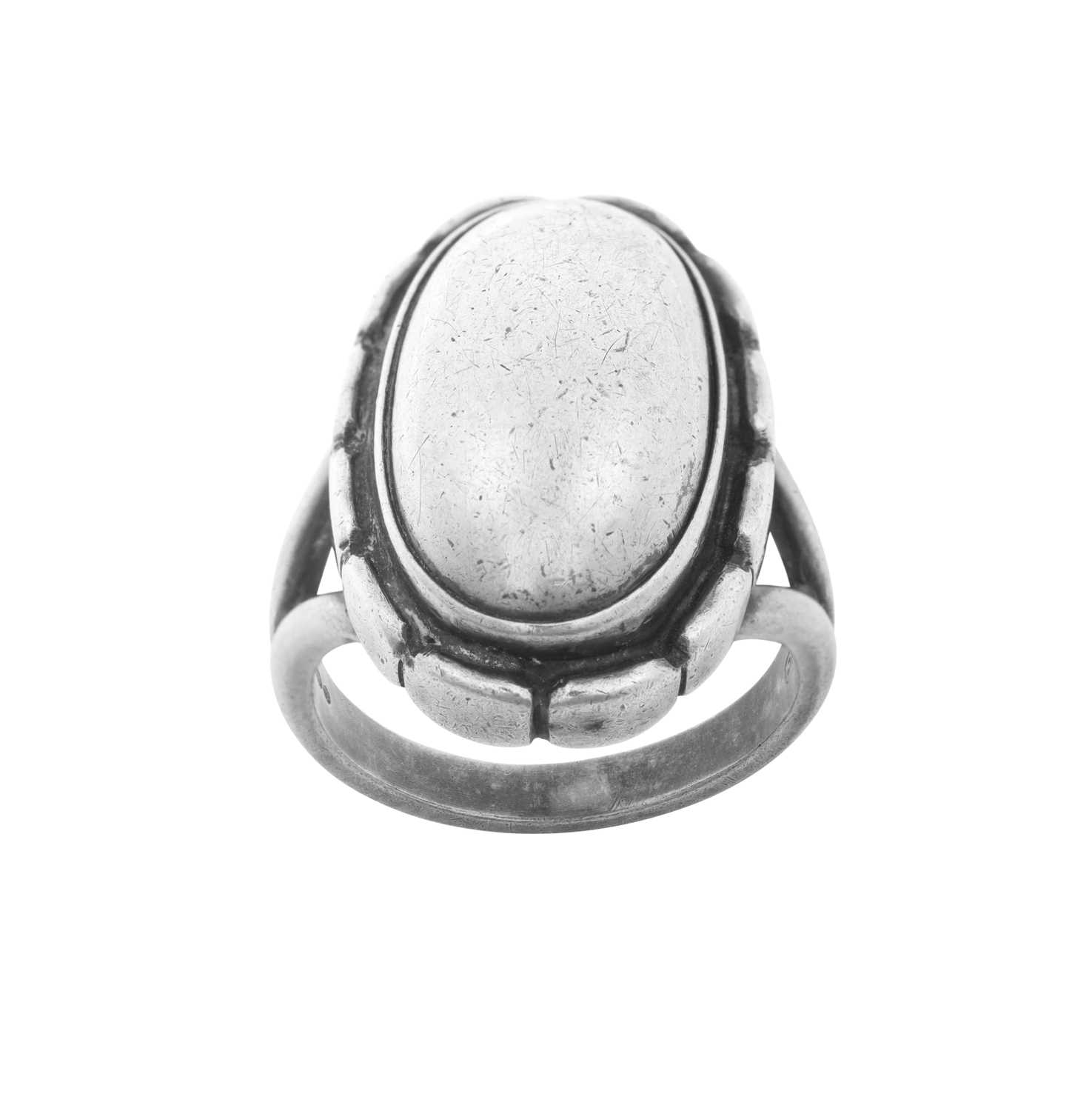 A Silver Ring and A Pair of Earrings, by Georg Jensen the oval plain polished dome within an oval