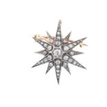 A Victorian Diamond Star Brooch/Pendant, circa 1880 an old cut diamond centres twelve radial arms,