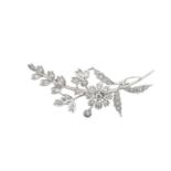 An 18 Carat White Gold Diamond Floral Spray Brooch set throughout with round brilliant cut and