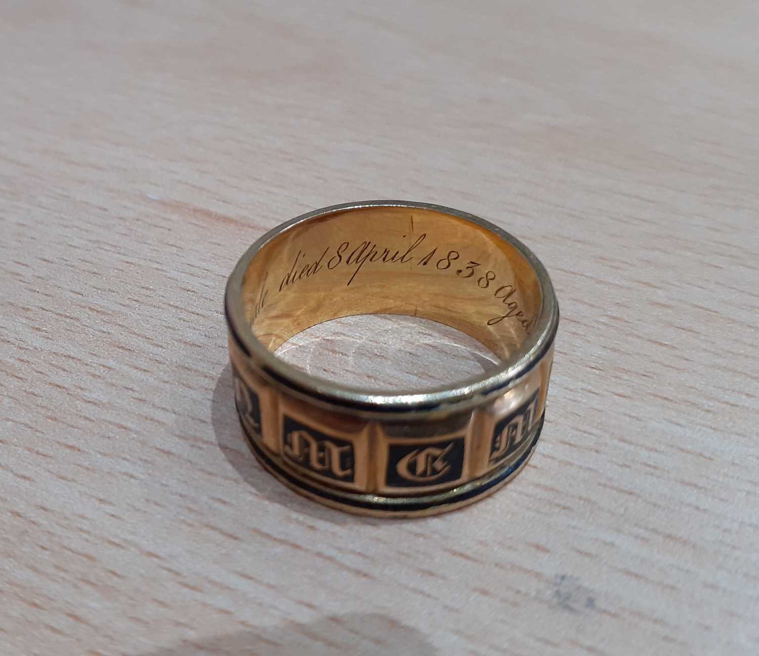 An 18 Carat Gold Enamel Mourning Ring the yellow broad band enamelled in black to read IN MEMORY OF, - Image 5 of 7