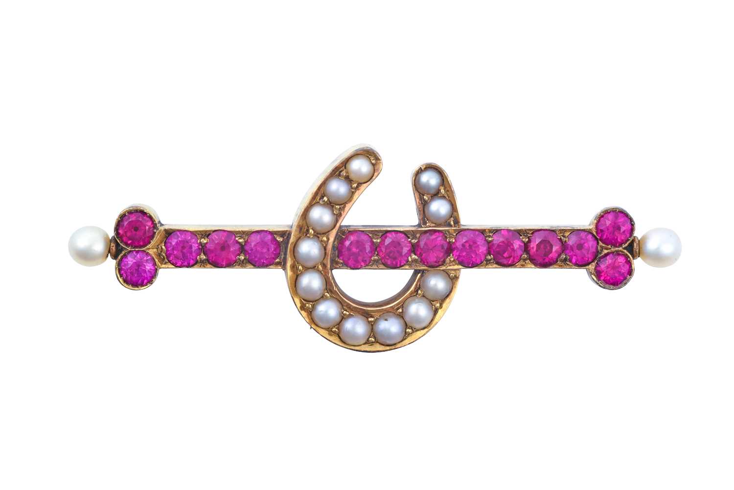 A Synthetic Ruby and Split Pearl Brooch a round cut synthetic ruby bar terminating to seed pearls