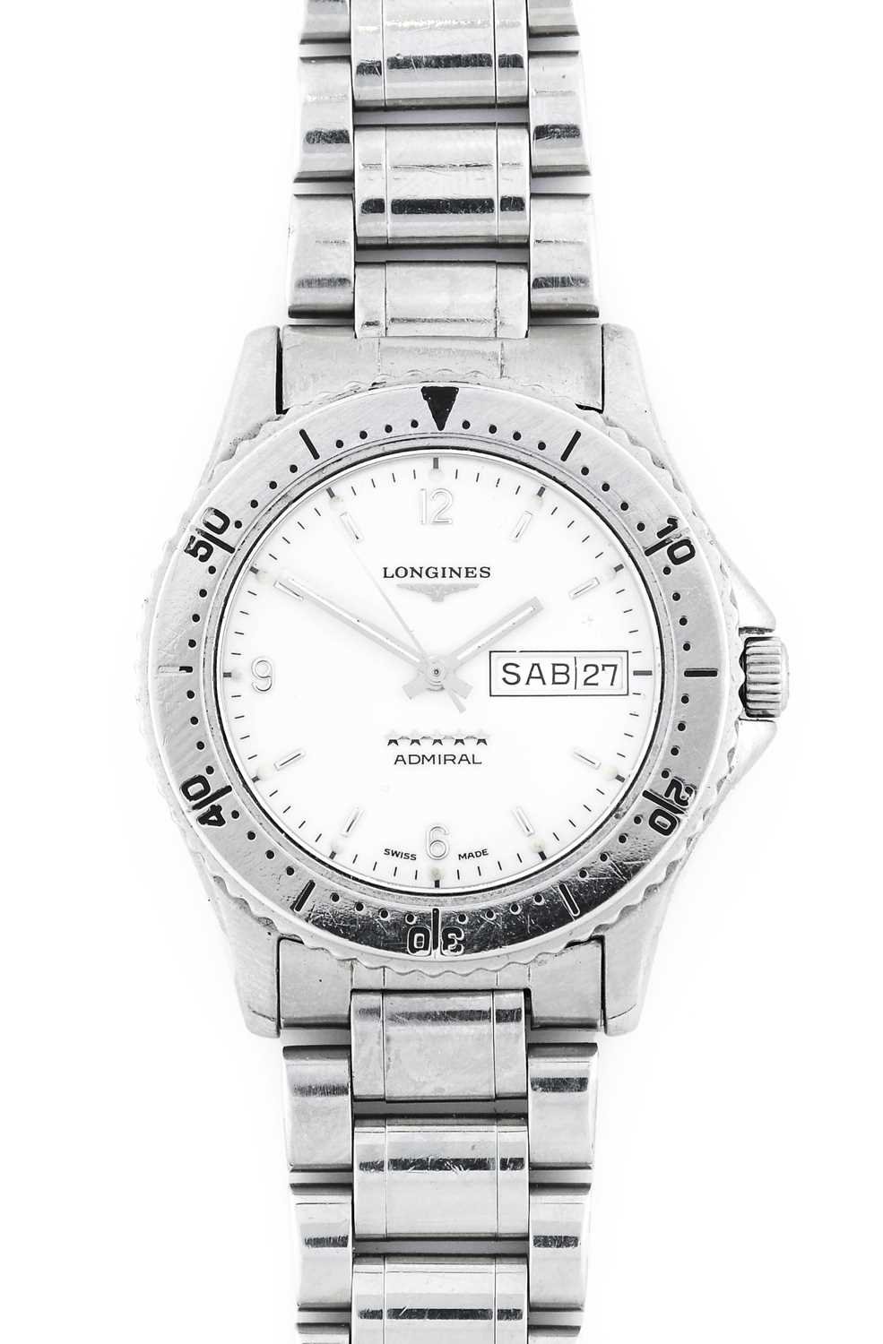 Longines: A Stainless Steel Automatic Day/Date Centre Seconds Wristwatch, signed Longines, model: