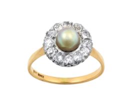 A Cultured Pearl and Diamond Ring the cultured pearl within a border of old cut diamonds, in white