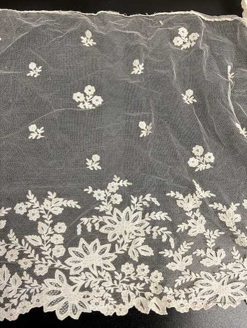 Early 20th Century Lace, comprising an embroidered net skirt mount decorated with floral sprigs, - Image 3 of 6