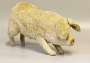 Early 20th Century Steiff Plush Mohair Standing Pig with blue glass eyes, button tag to the left