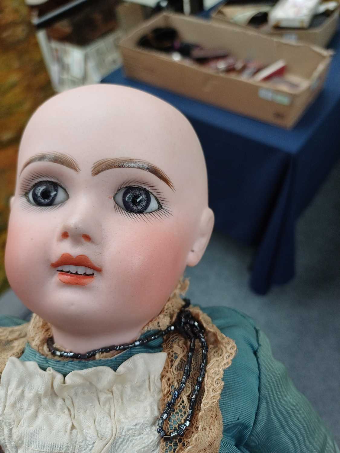 Small Bisque Socket Head Doll with fixed blue eyes, open mouth, teeth, pierced ears, auburn wig, - Image 2 of 8