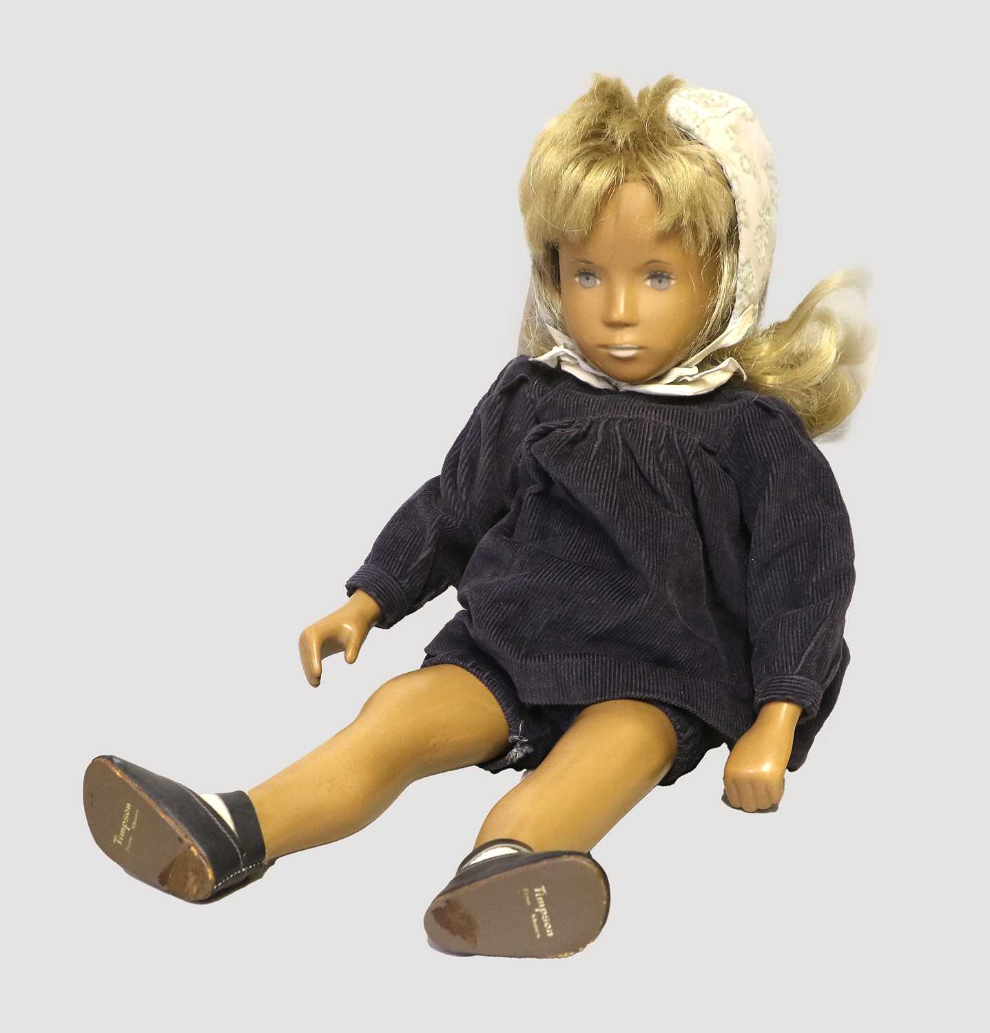 Circa 1960s Trendon Sasha Doll, with hand painted blue eyes, blonde wig, wearing original blue