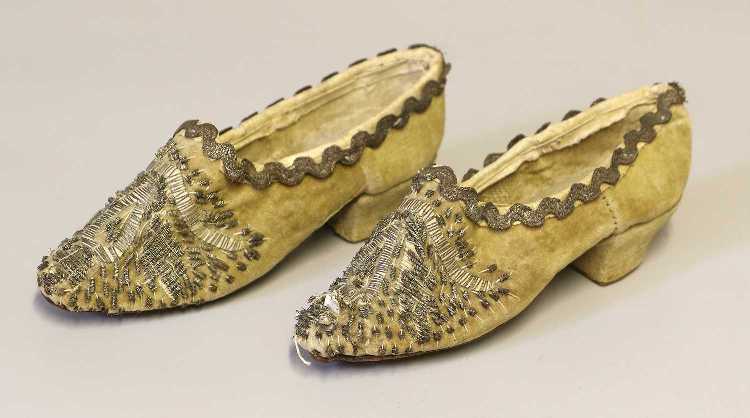 Circa 1840 Pair of Childs Cream Velvet Heeled Shoes, with silver embroidery, appliqué and ricrac