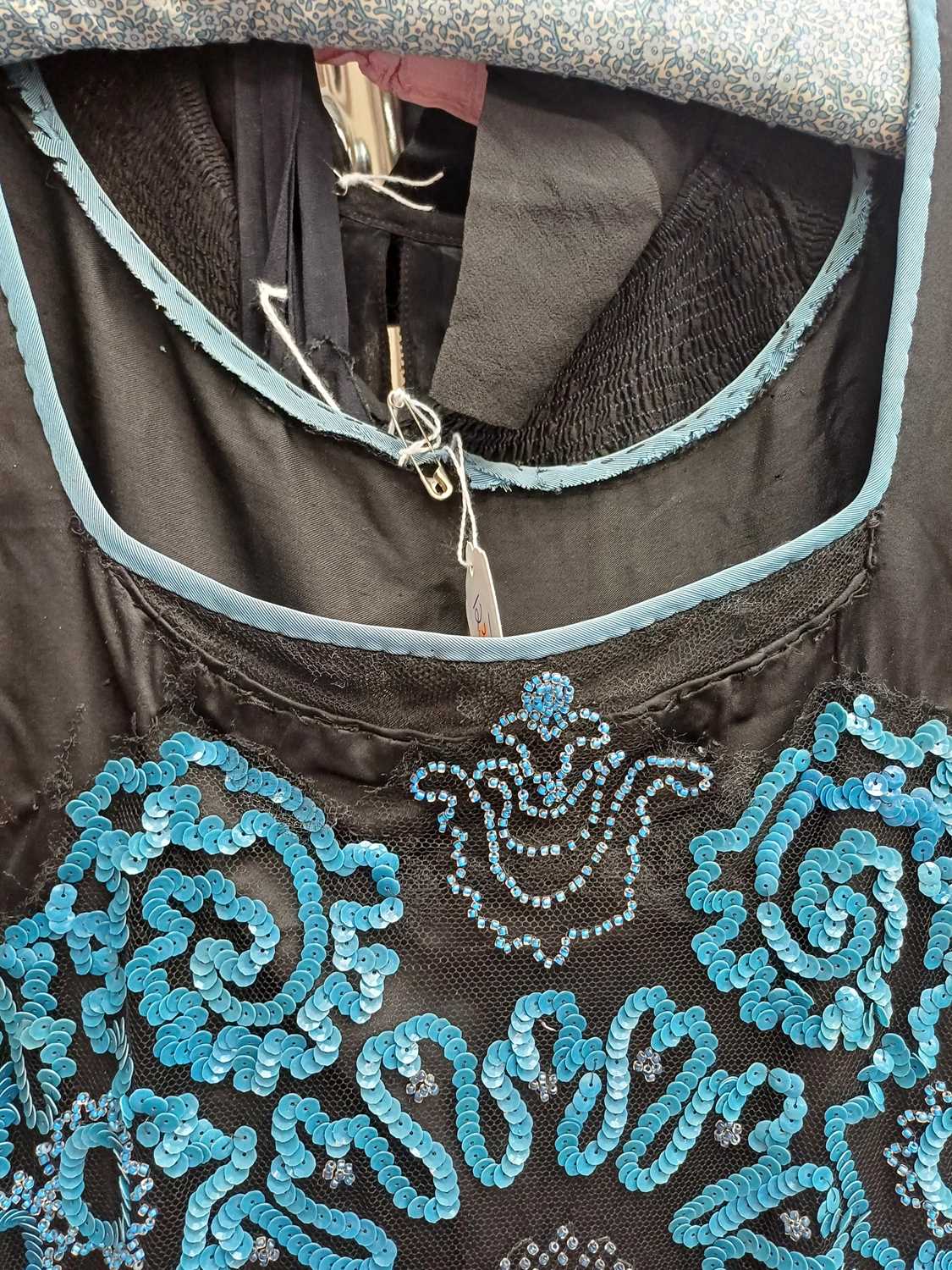 Circa 1920s Ladies Evening Dresses comprising a black silk dress with black net mount, blue sequin - Image 10 of 28