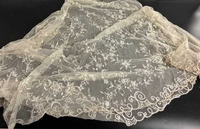 Early 20th Century Lace, comprising an embroidered net skirt mount decorated with floral sprigs, - Image 5 of 6