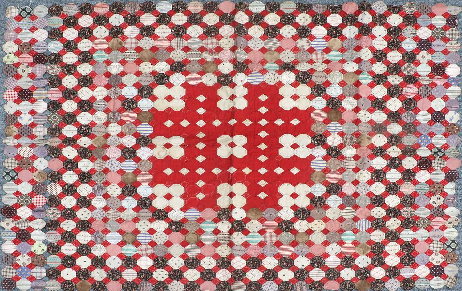 19th Century Unfinished Patchwork Quilt, incorporating octagonal cotton patches with a centre square