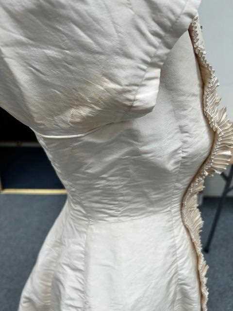 Victorian Cream Silk Wedding Dress with multi pleated trims to the front, cuffs and hem, button - Image 10 of 11