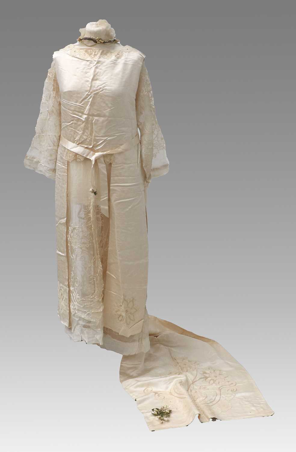 Early 20th Century Cream Silk Wedding Dress of sleeveless tabard style with ribbon ties to the