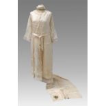 Early 20th Century Cream Silk Wedding Dress of sleeveless tabard style with ribbon ties to the