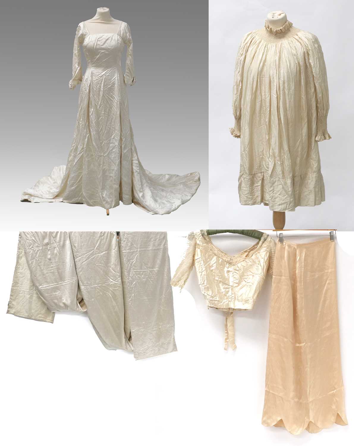 Early 20th Century Costume comprising an ivory silk wedding dress with boat shaped neck, half