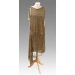 Circa 1920s Gold Lace Mounted Sleeveless Drop Waist Dress, with multi-coloured jewelled waistband,